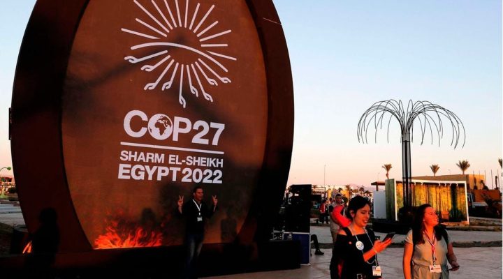 People walk at the green zone of the Sharm el-Sheikh International Convention Centre, during the COP27 climate conference in Egypt's Red Sea resort city of the same name